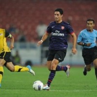 Two late goals win Arsenal the game